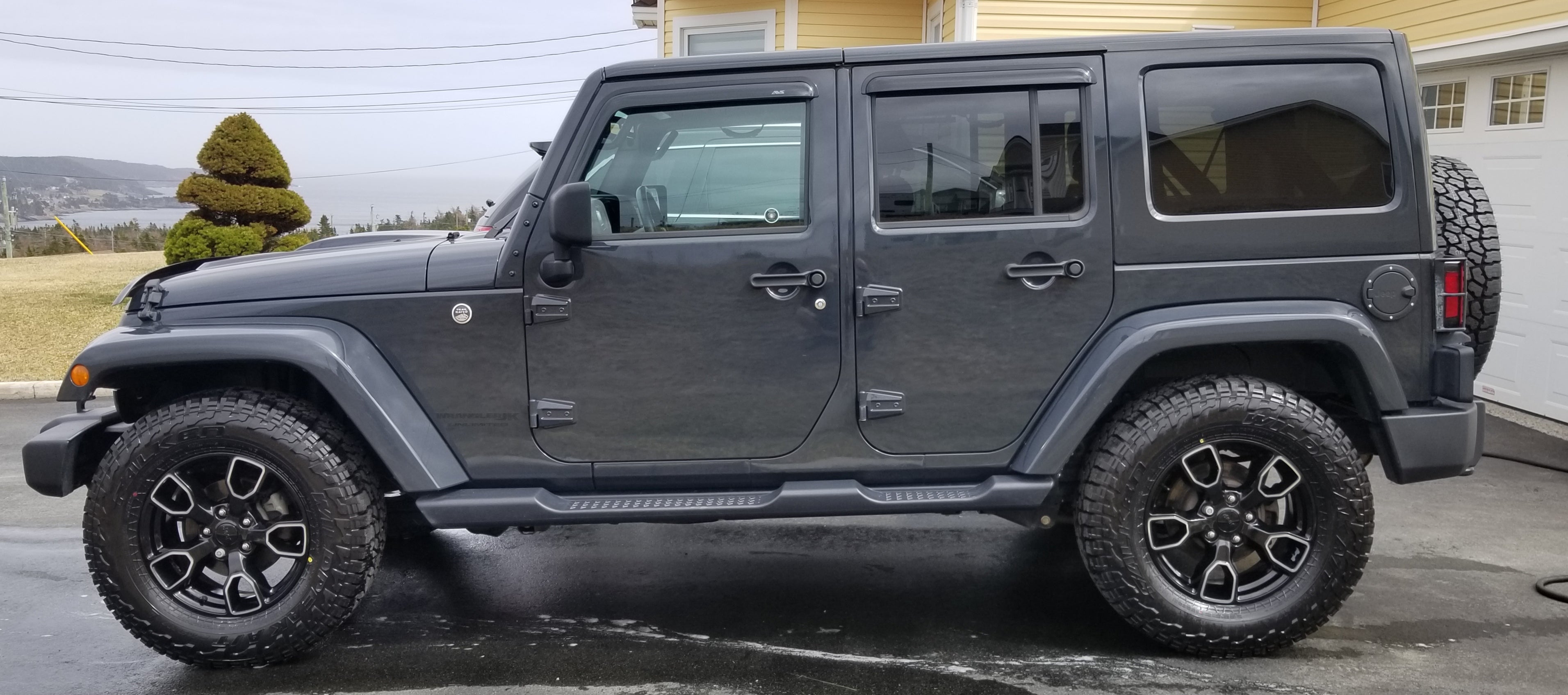275/70/18 on stock wheel fitment on spare carrier | Jeep Wrangler Forum